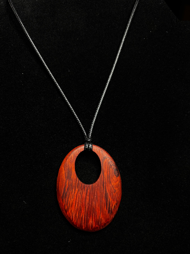 Handcrafted Padauk Oval Pendant Necklace – Artisan Wood Statement Jewelry – Earthbound Echoes