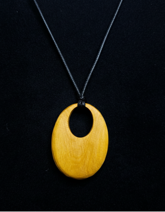 Handcrafted Yellowheart Oval Pendant Necklace – Artisan Wood Statement Jewelry – Earthbound Echoes
